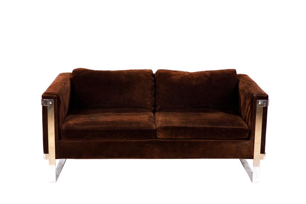 VINTAGE CHROME AND BROWN SUEDE TWO SEAT SOFA: In the manner of Le Corbusier. ca. 1970 H. 25 W. 61 D. 32 1/2 in Wear consistent with age