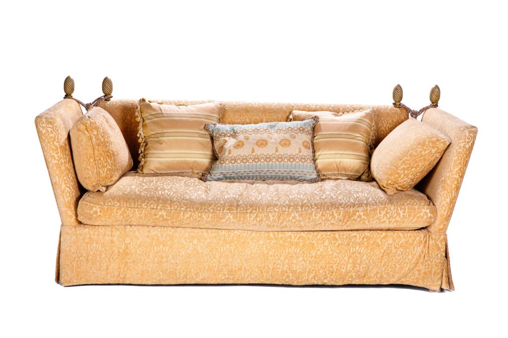 CONTEMPORARY KNOLL STYLE SOFA: Gold damask upholstery, painted wood pineapple form finials with down filled cushion and pillows. H. 34 W. 85 D. 35 in.