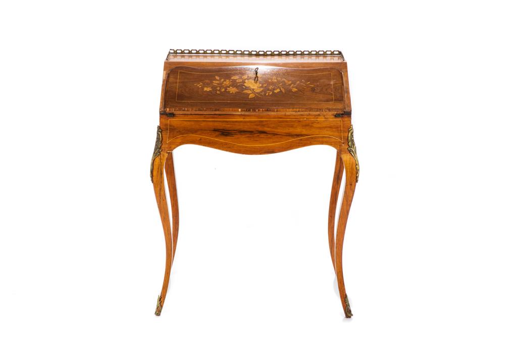19TH C FRENCH ROSEWOOD SECRETAIRE DESK: With gallery top, central satinwood inlay, cabriole legs and ormolu mounts. Folds down to reveal fitted interior.H. 36 W. 28 1/4 D. 17 3/4 in