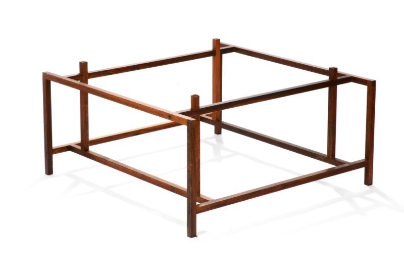 KOMFORT MID C DANISH ROSEWOOD COFFEE TABLE: Multi level geometric form. Glass top not included. Maker's label on underside. H. 16 W. 31 1/2 D. 31 1/2 in