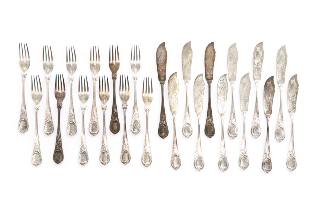 SET OF GRATCHEV SILVER FISH FLATWARE, 1,123g: Set of twelve fish forks and twelve fish knives with engraved reed and fish details, each piece terminating in a cartouche with central monogram. Hallmarked on the reverse with Br. Grachev (Brothers G