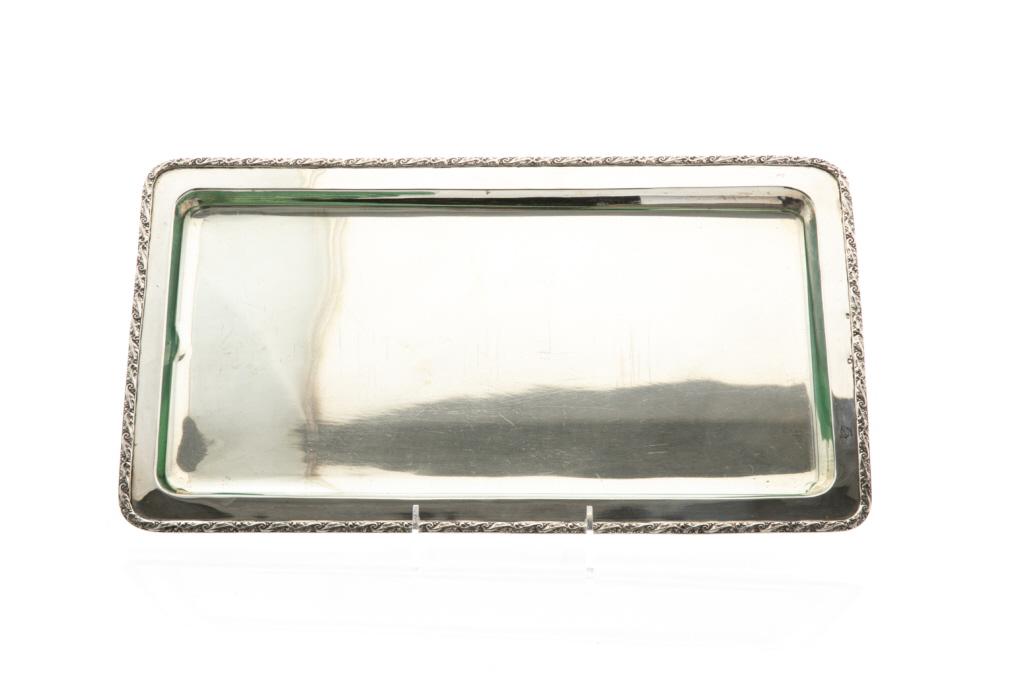 RECTANGULAR CZECHOSLOVAKIAN SILVER TRAY, 766g: A rectangular silver tray with a scrolling fern border. Together with a fitted glass tray. Hallmarked to the top edge with third standard mark (.800), c.1921-1929, with maker's mark. L. 41.2 cm (16 1/