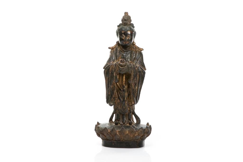 MING GILT & LACQUERED BRONZE DAOIST STATUE: Standing on a double layer lotus base, holding implement in hand. Gilding and lacquer to body. Ming dynasty. H. 37.5cm (14 3/4 in.)
