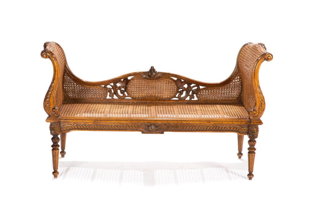 FRENCH CANED & CARVED WOOD SETTEE BENCH: With low back, double layered elongated s-form sides, carved apron and reeded legs, first half 20th C.