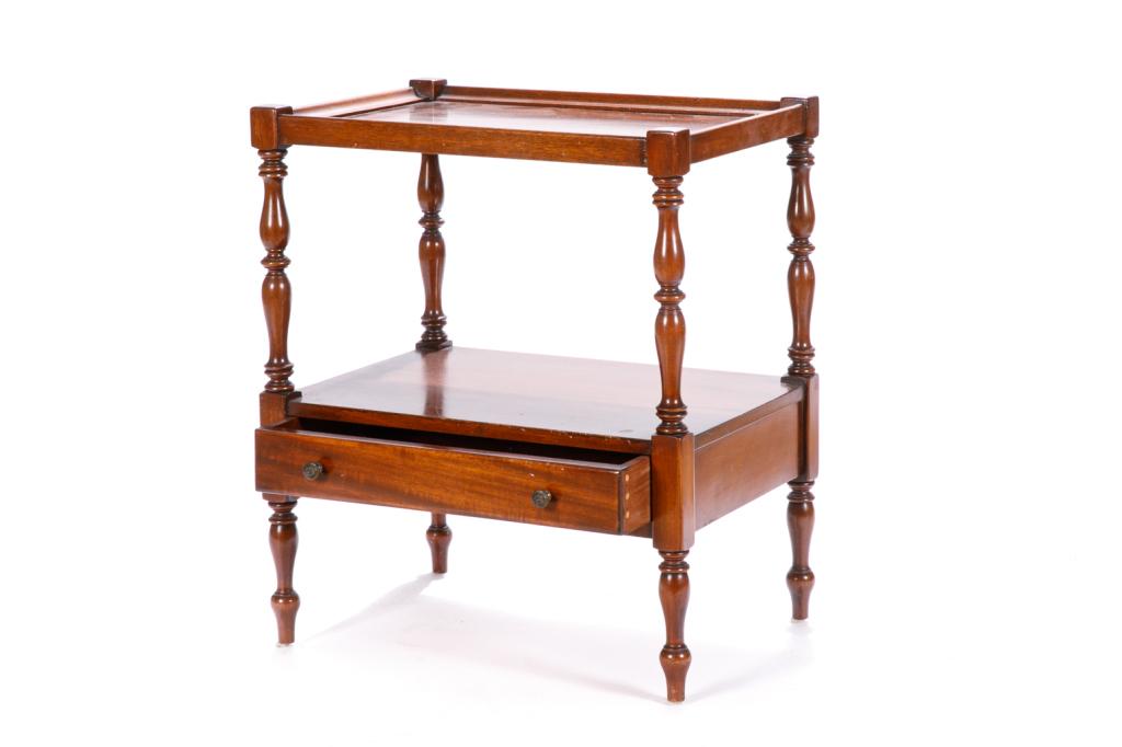 GEORGIAN MAHOGANY SINGLE DRAWER SIDE TABLE: A two-tiered side table with turned supports and single drawer. H. 21 W. 18 D. 13 in.