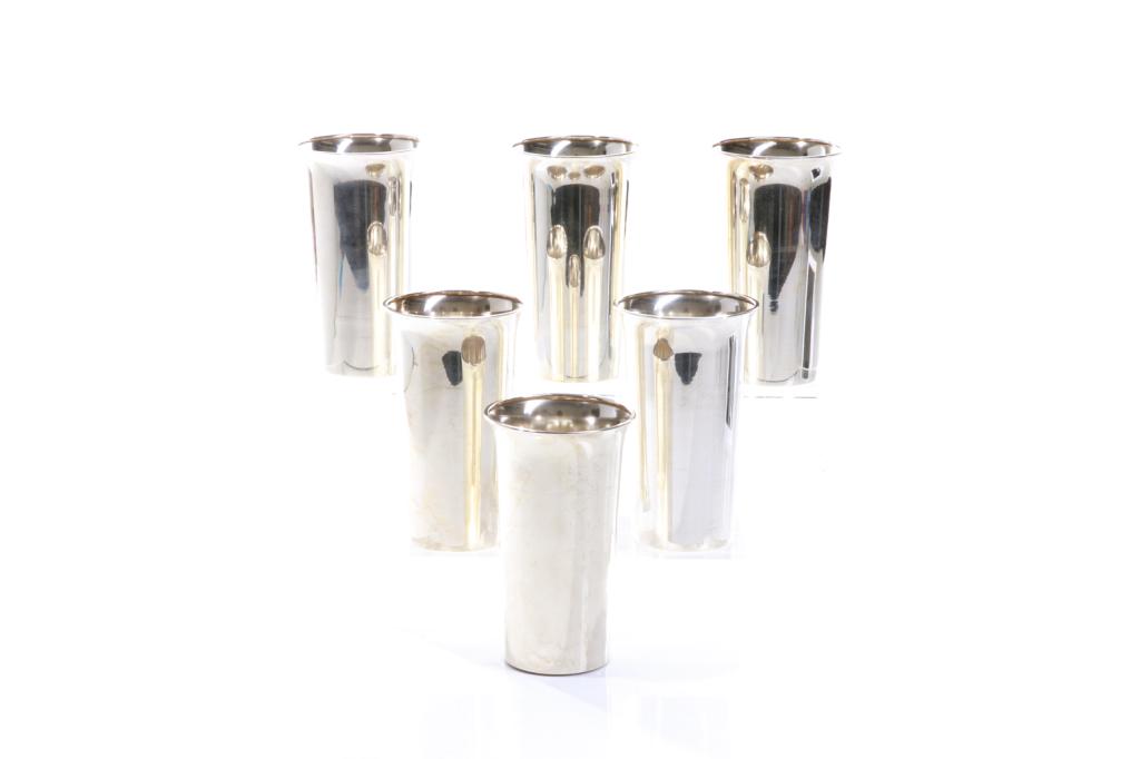 SIX AMERICAN SILVER TUMBLER CUPS, 716g: Straight sides with slightly flared rims, maker's mark MFH, model no.89. H. 12.7cm (5in) 716g