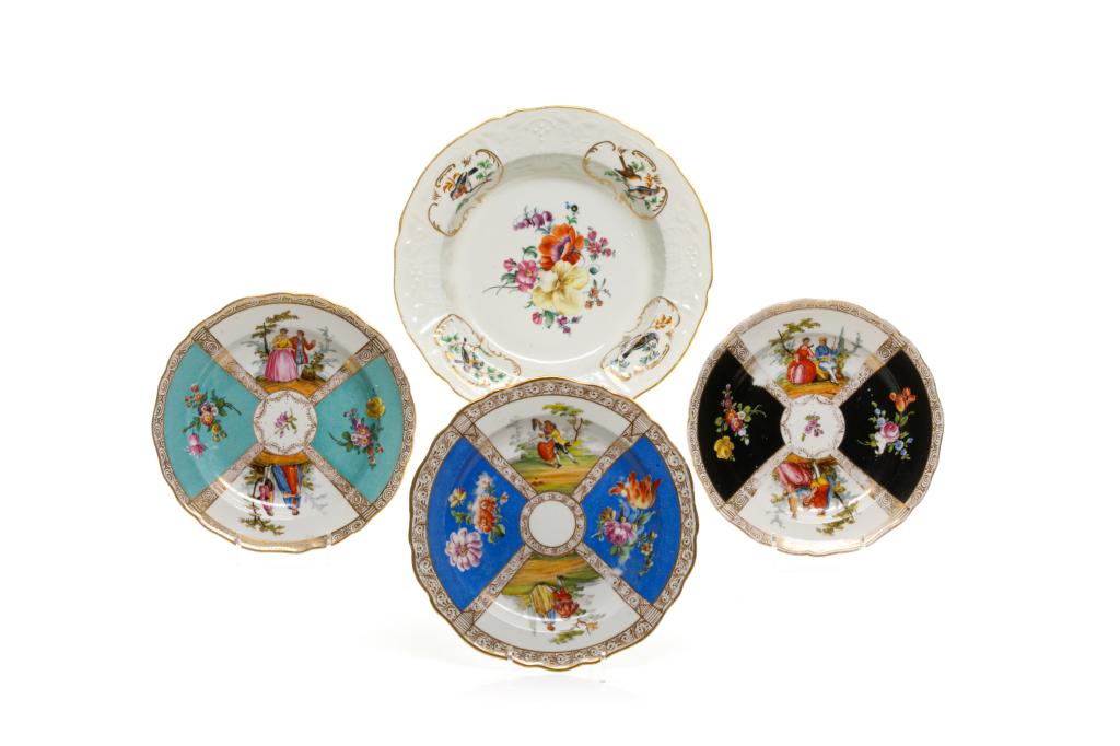 FOUR ASSORTED MEISSEN PORCELAIN PLATES: German, early 20th century hand painted. With stamp marks on the underside of each, gilded trims and scalloped edges. Three smaller dishes each are divided into four panels, with alternatingfigural sc