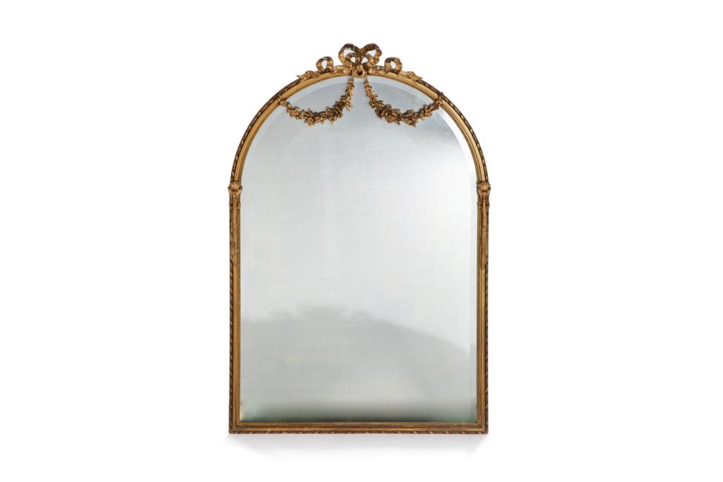 ANTIQUE GILTWOOD MIRROR: Antique carved giltwood mirror with swag decoration and beaded rim. Late 19th/ early 20th century H. 42 1/4 W. 28 in Condition Report Conditionreport available upon request.