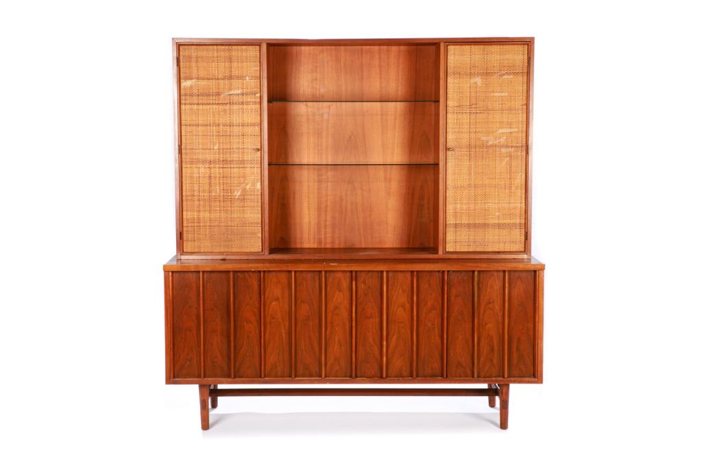 WIDDICOMB CO. NAKASHIMA WALNUT FINISH BUFFET AND HUTCH: John Widdicomb Furniture Co. sideboard designed by George Nakashima, Origins line, model 4024, stamped 9/59 Titian. The upper portion flanked by caned doors. H. 72 1/4 W.68 3/4 D.20 in. Dimensions of