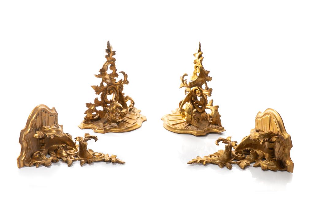 FOUR GILT WOOD ITALIAN ROCOCO STYLE WALL BRACKETS: With heavily carved foliate design, bracket shelves. H. 28 cm (11 in)W. 26 cm (10 1/4 in) Condition Report Some cracks to wood, additional details / condition report available upon request.