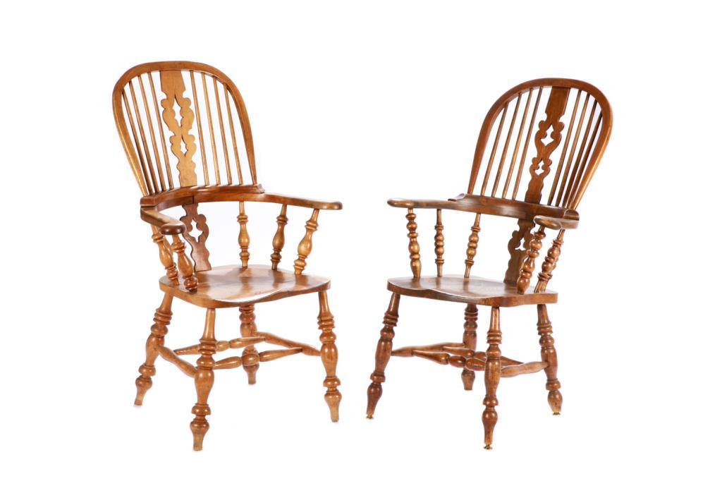 NEAR PAIR 19TH C YORKSHIRE WINDSOR CHAIRS: Of yew and elm wood with decorative splat characteristics, hooped back, turned supports and legs, and 'smoker's bow' chair base. English, mid-19th C. H. 43" W. 2"6 D. 19"