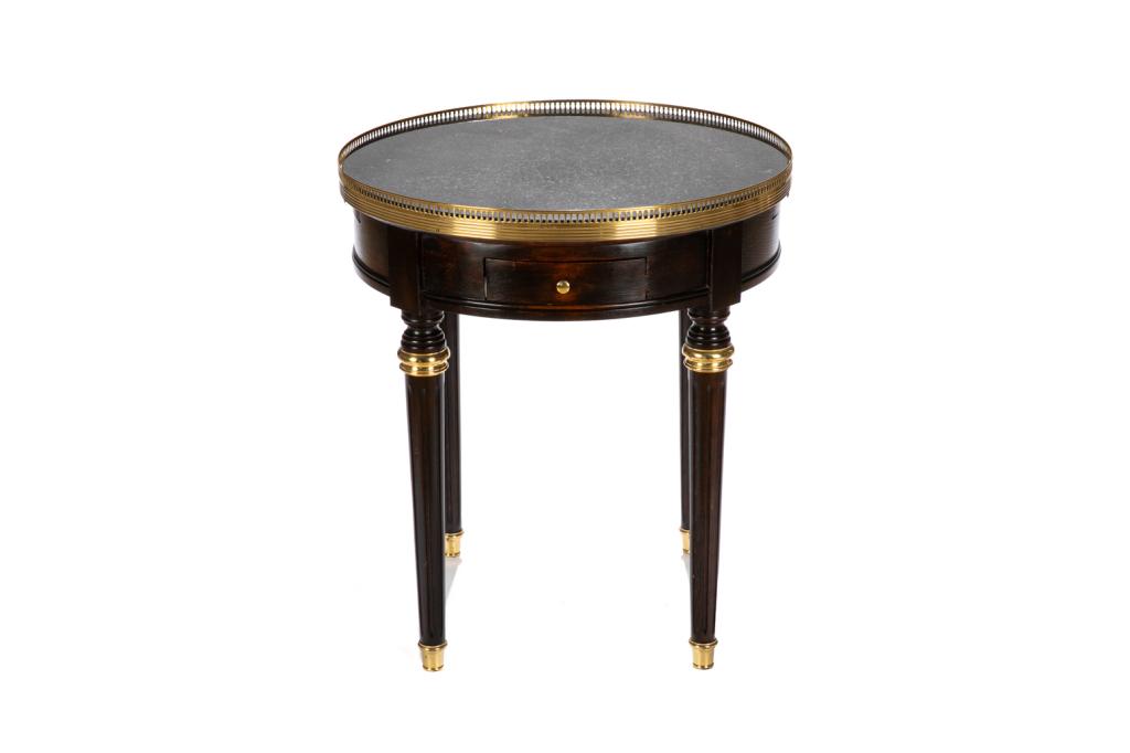 CONTEMPORARY BOULETTE TABLE: Circular table on four tapered and reeded legs with brass mounts. Pierced brass gallery. One drawer and two slides. 20th c. H. 26 3/4" D. 24"