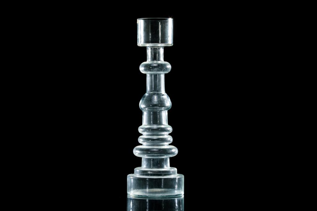 NUUTAJARVI NOTSJO LIGHTHOUSE GLASS CANDLEHOLDER: Finland, 20th century. Scandinavian art glass by Oiva Toikka, clear "Pikku-Majakka" design with tiered body. Signature inscribed to the underside of the base. H. 49 cm (19 1/4)