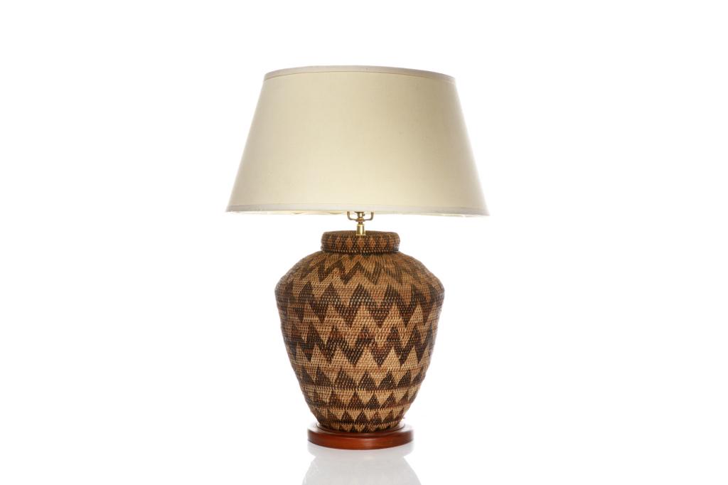 AFRICAN BASKET WAVE STYLE TABLE LAMP: Basket weave base in two-toned chevron pattern, mounted as table lamp. H. to finial: 69.9 cm (27 1/2 in.)