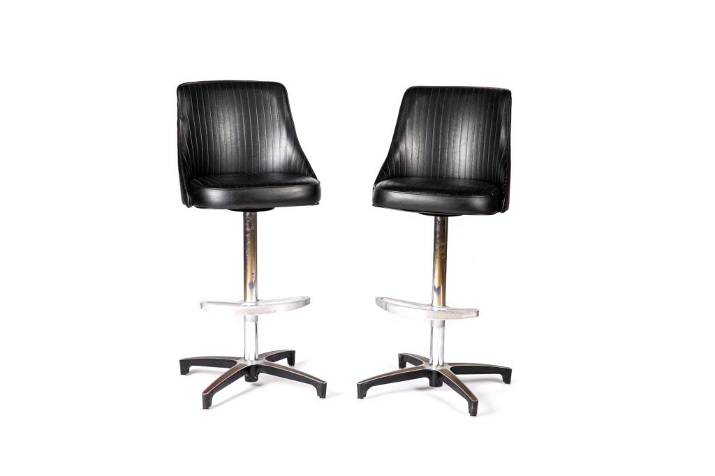 PAIR OF MID CENTURY VINYL BAR STOOLS: Ribbed vinyl seat on mixed metal swivel base by Liberty Ornamental Limited, Toronto. Mark on underside. 20th c. H. 42 1/4" D. 24 1/2 H. to seat 26"