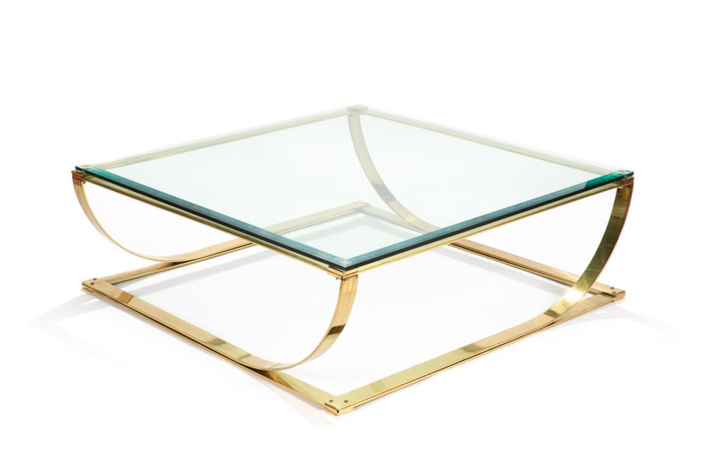 VINTAGE BRASS AND GLASS COFFEE TABLE: Brass curvilinear open square base with clear glass top. Mid-twentieth century. H. 15 1/2" W. 44" D. 44"