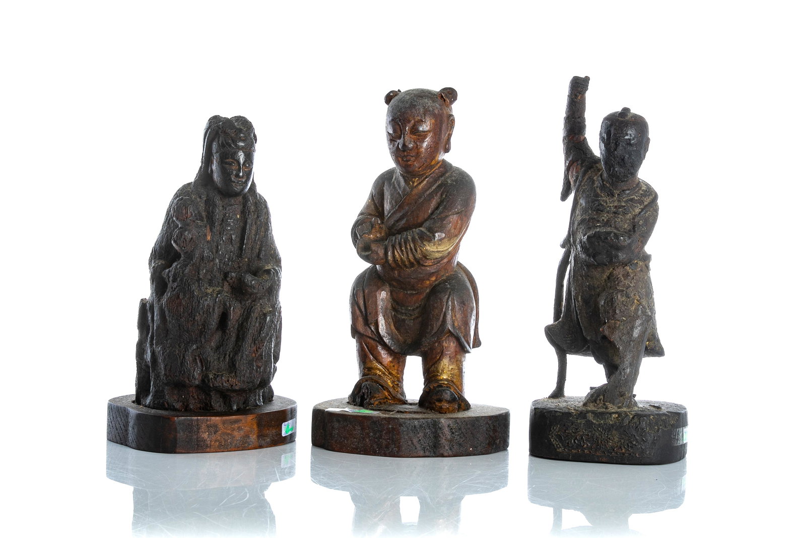 THREE EARLY CHINESE WOOD CARVED FIGURES: 晚明清早期 木雕人物 Including a Songzi Guanyin figure, and two deity and attendant figures. Ming to early Qing dynasty. Tallest: 28cm (11 in.) Pro