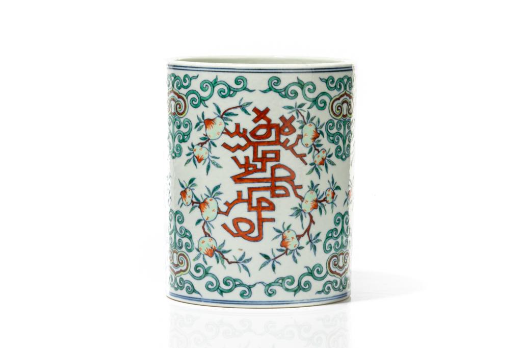 CHINESE DOUCAI PORCELAIN 'SHOU' BRUSHPOT: Painted with stylized iron red shou characters, peaches, and lingzhi ruyi branches. Underglaze blue Si Gan Cao Tang hall mark to base. Late 19th early 20th, late Qing to Republican period. H. 16cm (6 