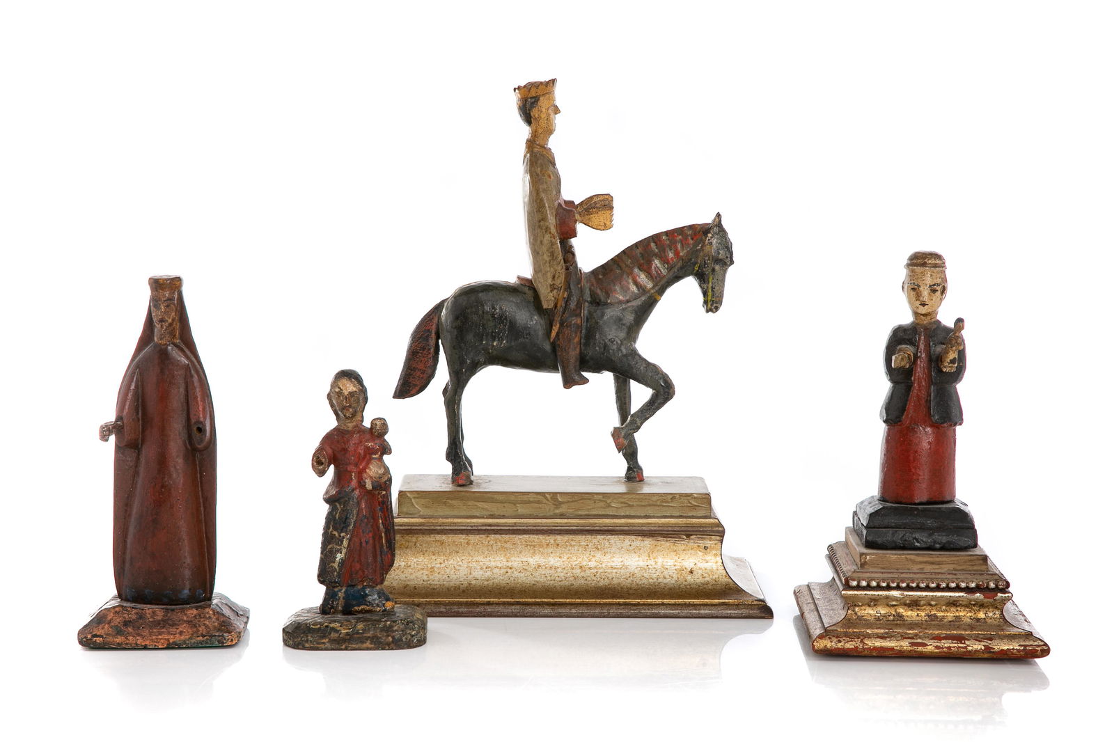 FOUR CARVED POLYCHROME SANTOS FIGURES (1 of 7)