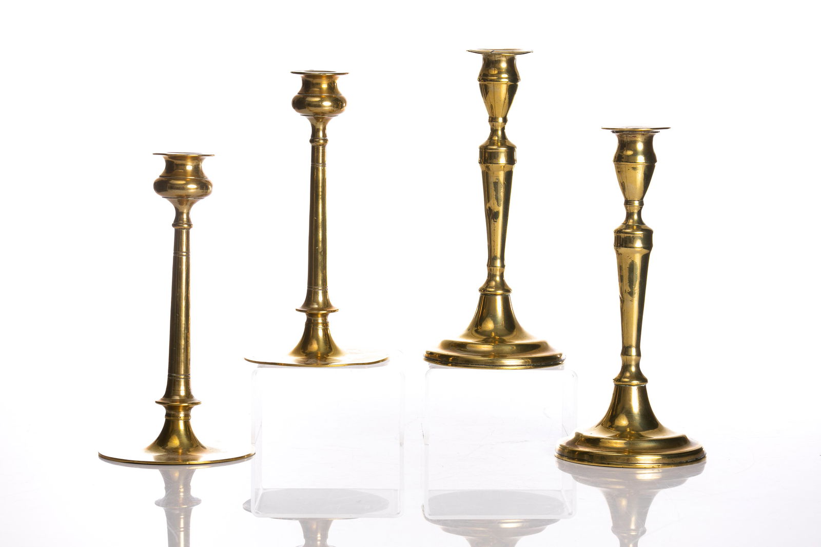 TWO PAIRS OF ANTIQUE BRASS CANDLESTICKS (1 of 1)