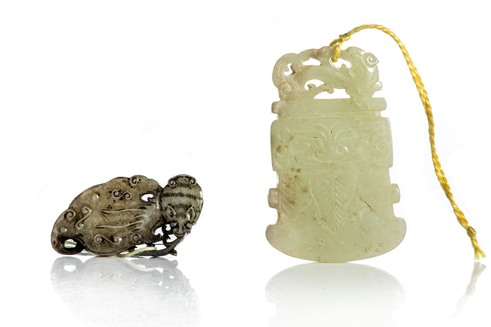 TWO JADE PENDANTS (1 of 2)