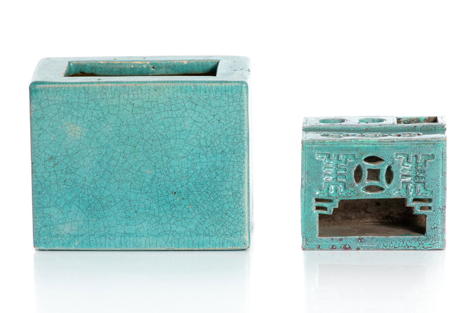 TWO ROBIN'S EGG GLAZED SCHOLAR PIECES: Rectangular vessel, early 20th century; together with reticulated coin openings, also rectangular in shape. H 8 cm x L 10 cm x D 6.7 cm (3 in x 4 in x 2 5/8in) and smaller