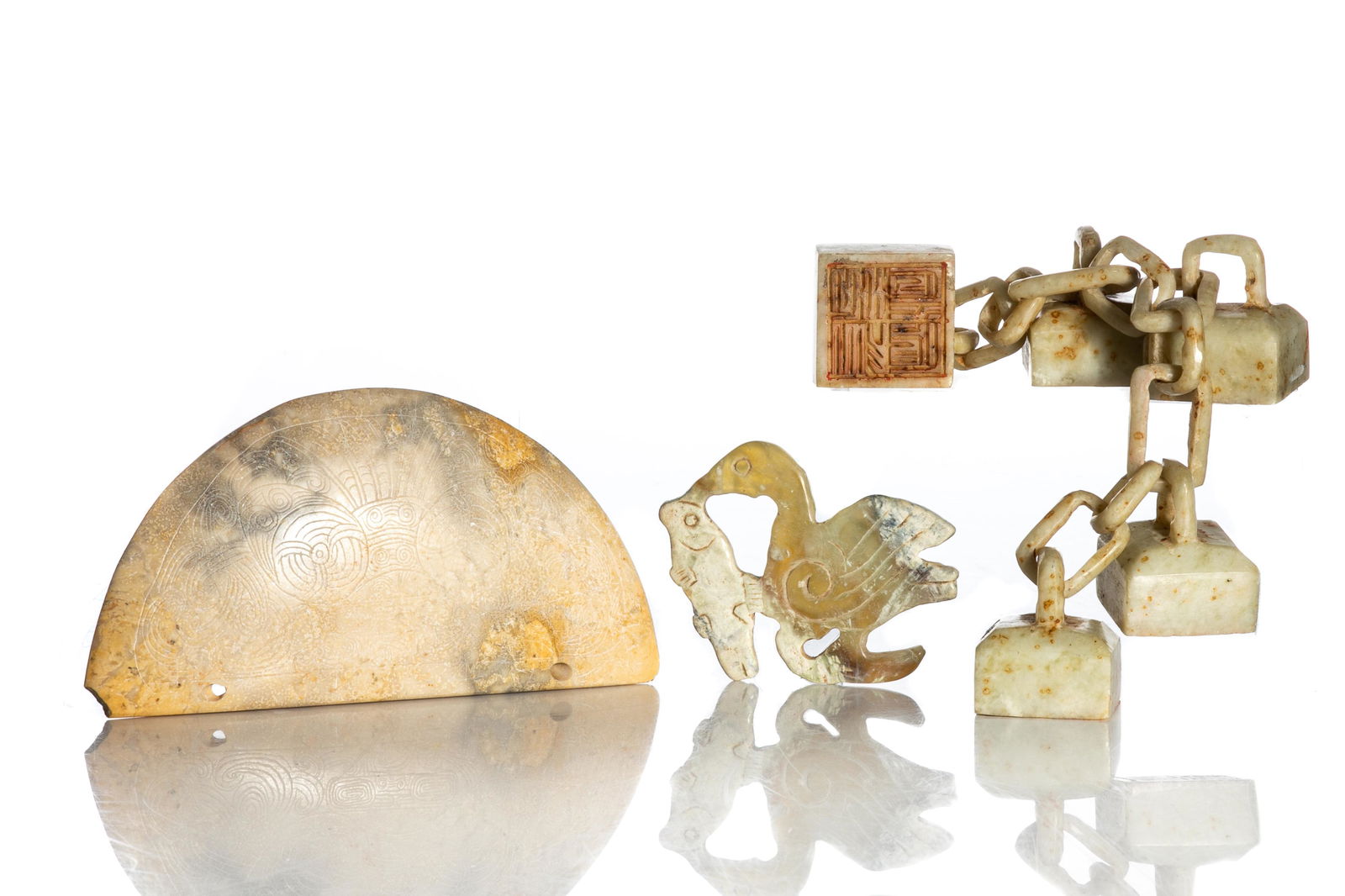 THREE PIECES OF NEOLITHIC STYLE CHICKENBONE JADES (1 of 1)