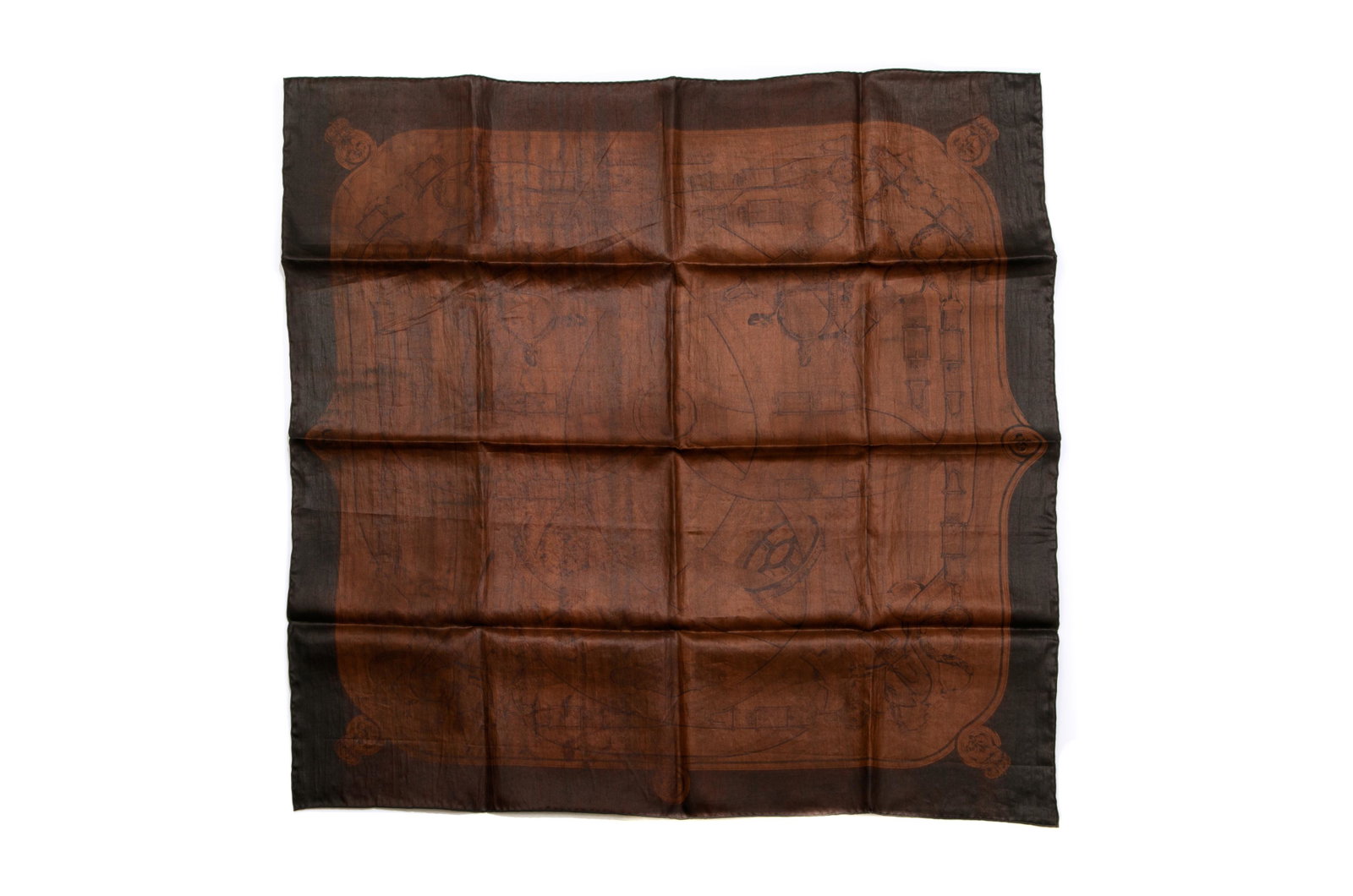 HERMES LIMITED EDITION SILK SCARF: Hermes limited edition 90cm carre silk "Clair de Lune Cavalcadour" scarf in brown and chocolate. With hand-rolled edges. Special process that resembles leather. With Hermes tag, information booklet an