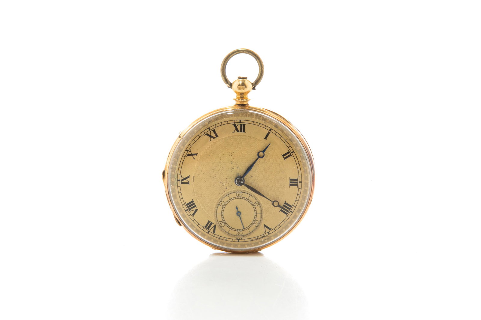 FRENCH GOLD POCKET WATCH: A French gold pocket watch marked 18 karat. The gilded face with an engine turned design and Roman numerals secondary dial. The key wound works marked J.T. Jacot total weight 58 gm.