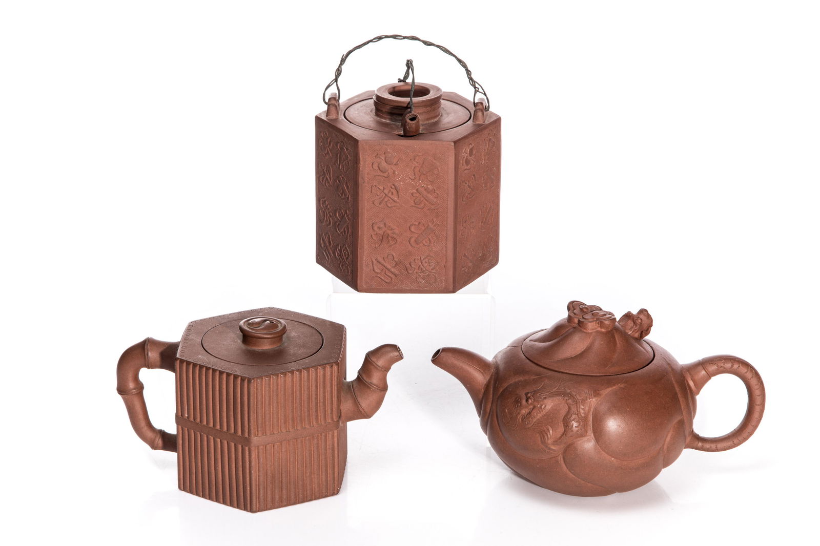 THREE YIXING TEAPOTS (1 of 8)