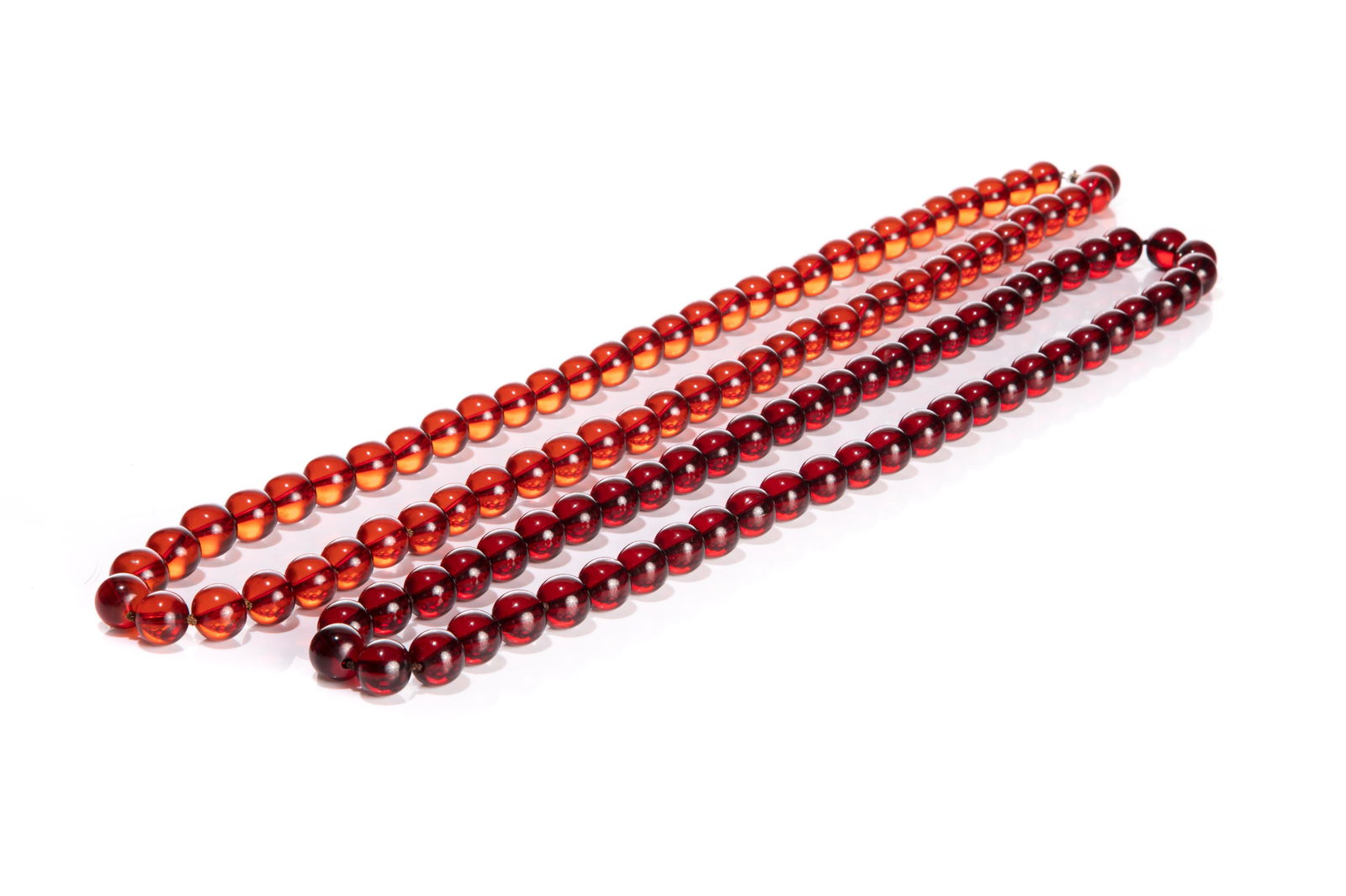 TWO LONG CHERRY AMBER BAKELITE BEADED NECKLACES (1 of 4)