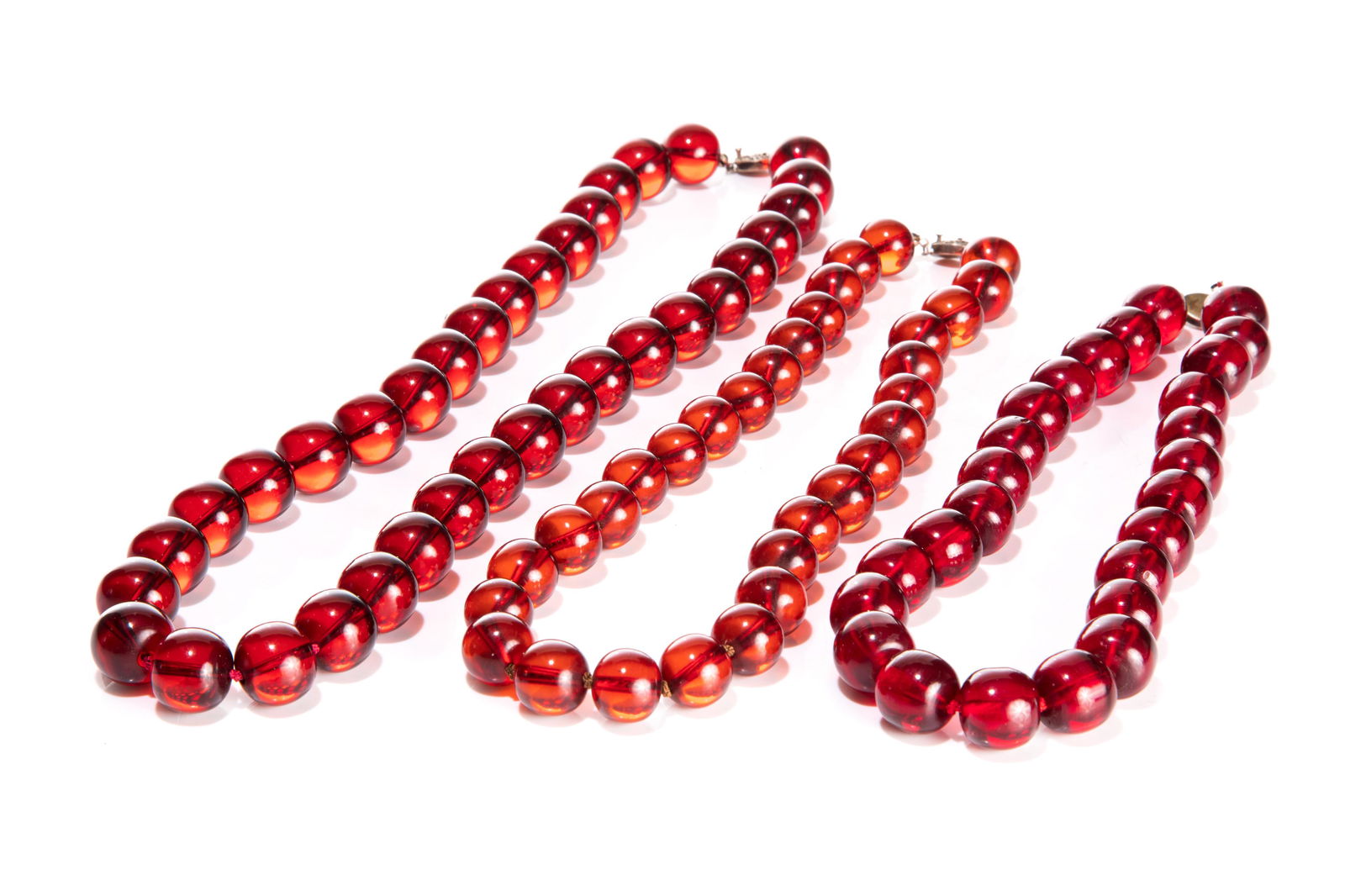 THREE CHERRY AMBER BAKELITE BEADED NECKLACES (1 of 3)