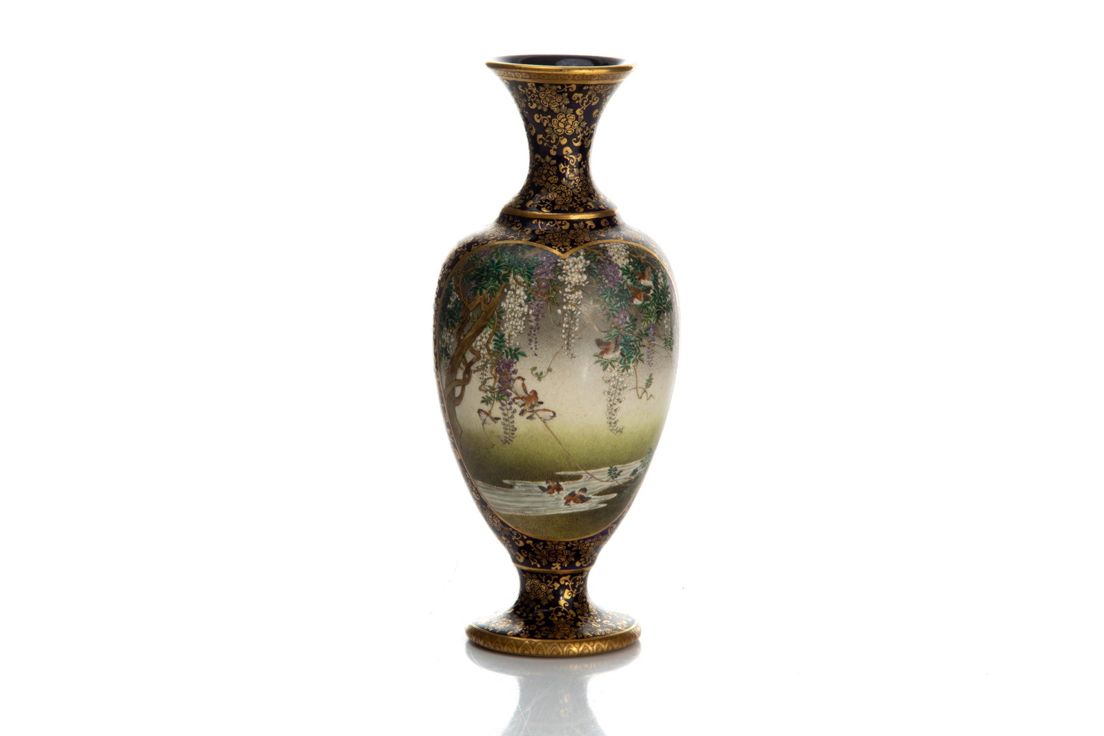 KINKOZAN BALUSTER VASE: Japanese, Meiji period, baluster vase with Kinkozan mark painted on interior of foot on a scroll surrounded by maple leaves. Deep blue ground on body with gilt floral patterns. Painted chordata-shaped