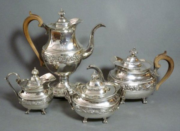 FINE PORTUGUESE SILVER TEA AND COFFEE SET c1820: Fine four piece Portuguese silver tea and coffee service ca 1820, Oporto. Total weight 3782g.Height of coffee pot 32 cm (12 5/8").