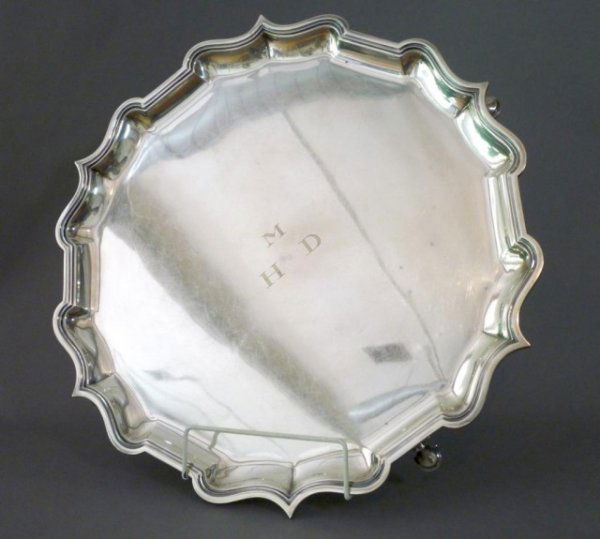 ELKINGTON SILVER PLATE FOOTED SALVER: Victorian English silver plate footed salver by Elkington & Co. Engraved initials 'H*M*D'. D 45.7 cm (18").