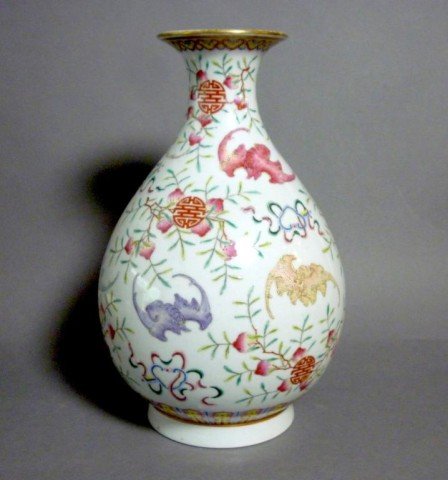 CHINESE FAMILLE ROSE VASE WITH BATS: Chinese famille rose pear form vase decorated with bats and shou symbols. Six character Guangxu mark in red, 20th century. H 29.5 cm (11 5/8").