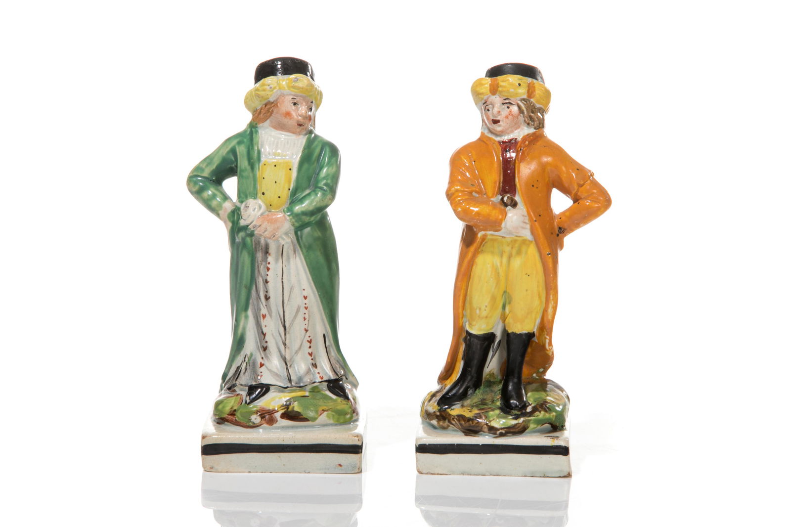 TWO STAFFORDSHIRE POTTERY ORIENTALIST FIGURES (1 of 4)
