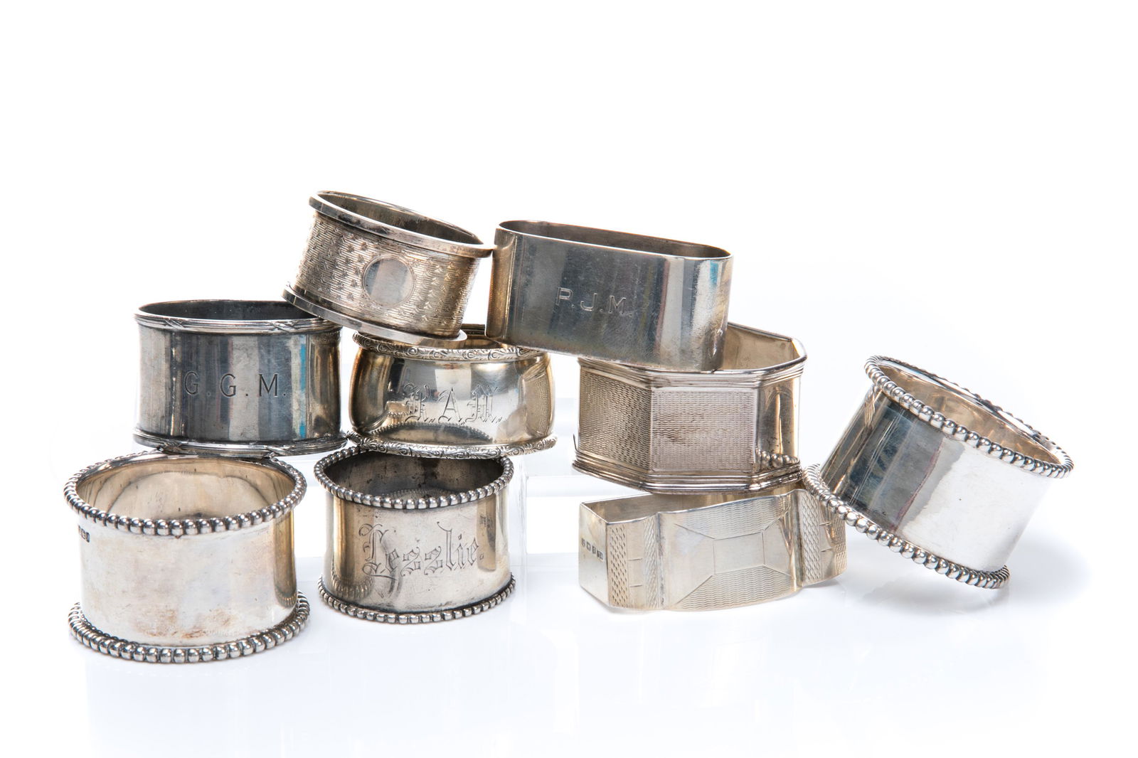 NINE ASSORTED SILVER NAPKIN RINGS 291g (1 of 5)