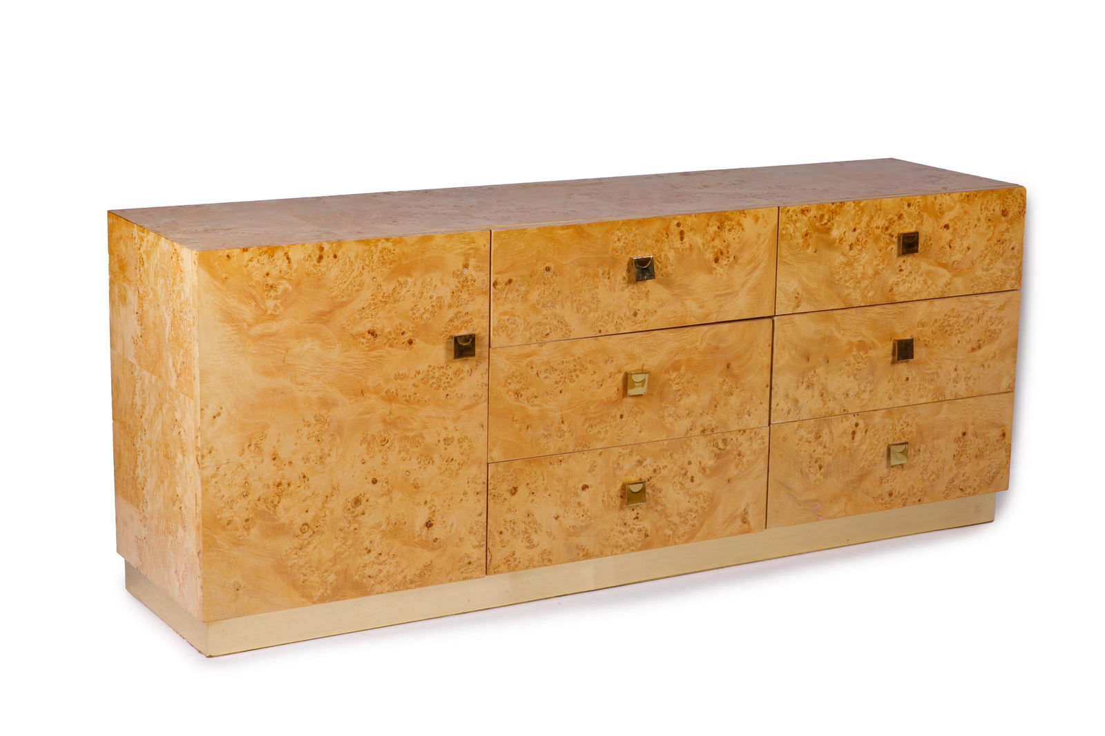 VINTAGE THOMASVILLE BIRDS EYE VENEER LOW DRESSER: Blonde birds eye maple veneer, six drawers and single cupboard low dresser with brass hardware and brassed trim. Interior of drawer marked Founders. Stamped on the back May 1979. H. 29" W. 72" D. 18 1