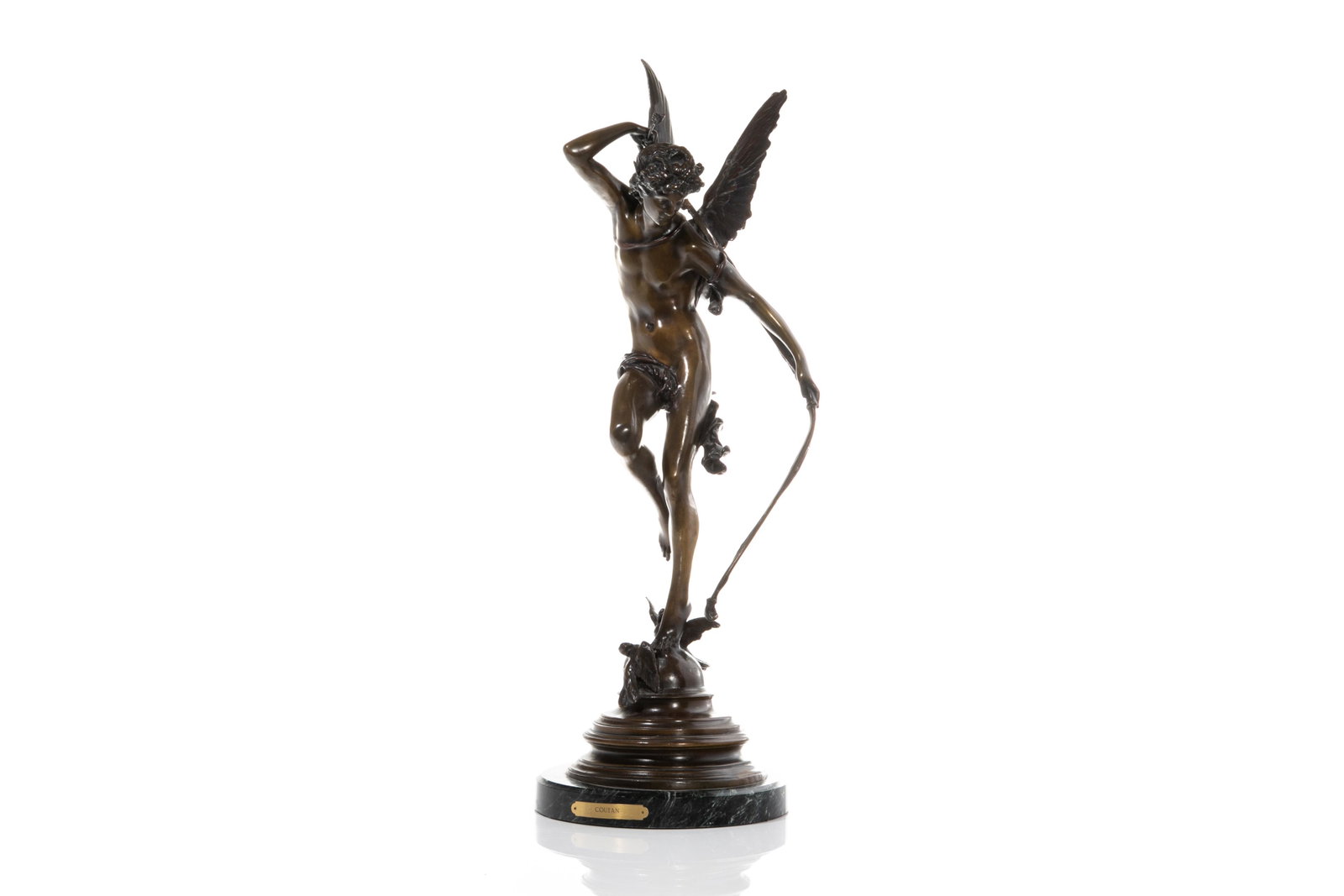 BRONZE CUPID AFTER JULES FELIX COUTAN (1848-1939): Patinated bronze figure after French artist Coutan, inscribed to the base "J. Coutan, Rome" with engraved name plaque to the front of circular marble base. Sculpture depicts nude mythological figure C