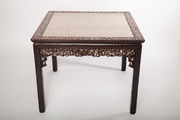 CHINESE ROSEWOOD AND M.O.P. MARBLE TABLE: Of square form with brown marble top. The apron heavily carved and inlaid with abalone and mother of pearl. China, 19th century. W 93cm (36 1/2in.)