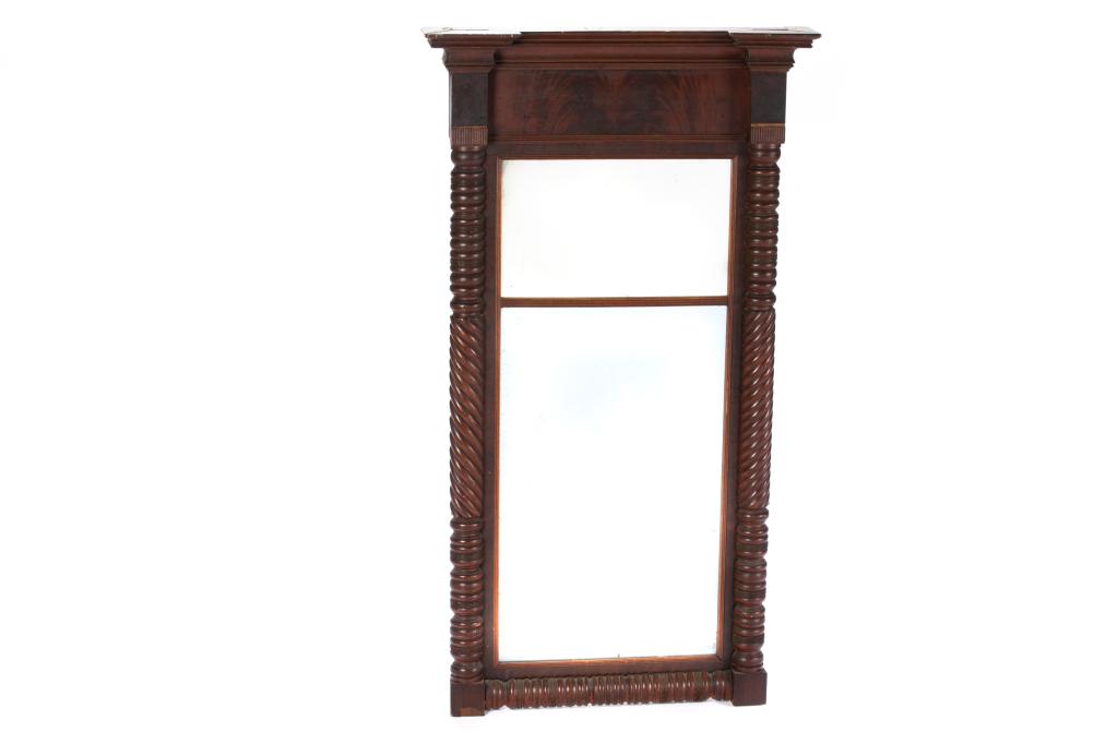 ANTIQUE CARVED WOOD MIRROR: Federal style with turned sides in flame mahogany, 19th C. H. 48 1/2" W. 26 1/2"