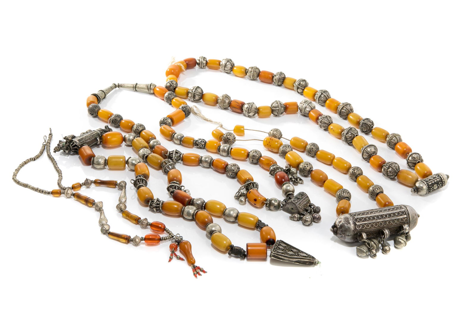 FIVE VINTAGE YEMENI BEDUOIN AMBER NECKLACES (1 of 2)