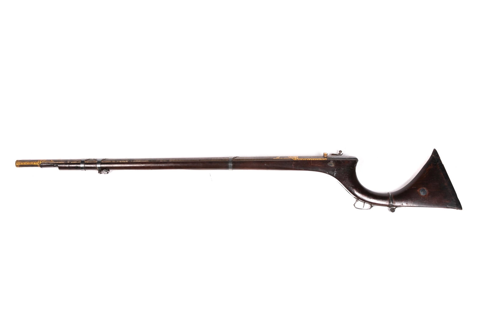 FINE MIDDLE EASTERN GOLD INLAID JEZAIL RIFLE: Ottoman or Persian long barrel rifle with gold inlay and distinctive curved stock, while allowed for the rifle to be tucked under the arm while riding. L. 67 in.