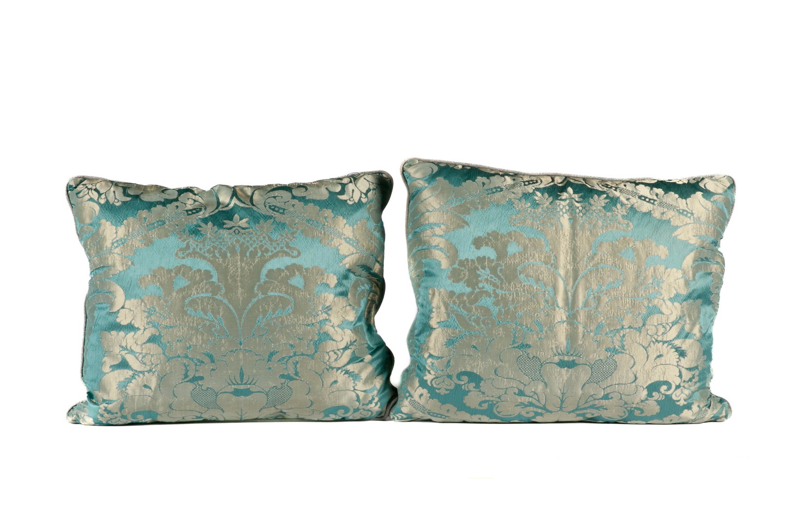 PAIR OF BLUE & SAGE DOWN FILLED PILLOWS: Blue jacquard silk pillows in sage foliate pattern on both sides. Later pillow fill and ribbed border. H. 51cm (20") W. 61cm (24") 20 x 23 in. Provenance: Property of a Prominent Canadian Collector