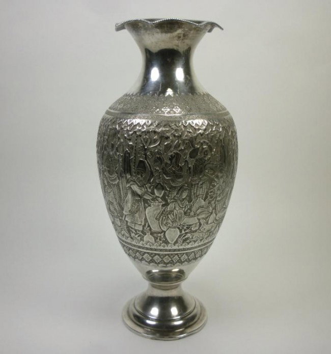 FINE PERSIAN DECORATED SILVER VASE: Baluster form with detailed decoration of figures and animals around the entire body in various activity. Floral top and bottom borders. Fully marked to base rim. Iranian, Early 20th century. H 38.7 c