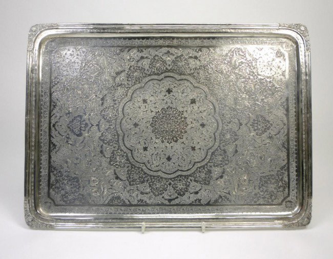 PERSIAN SILVER RECTANGULAR TRAY: Finely engraved with entwined decoration of birds, flowers, foliage and animals. Marked to bottom rim, Iranian early 20th century. L 38 cm. 954 grams.