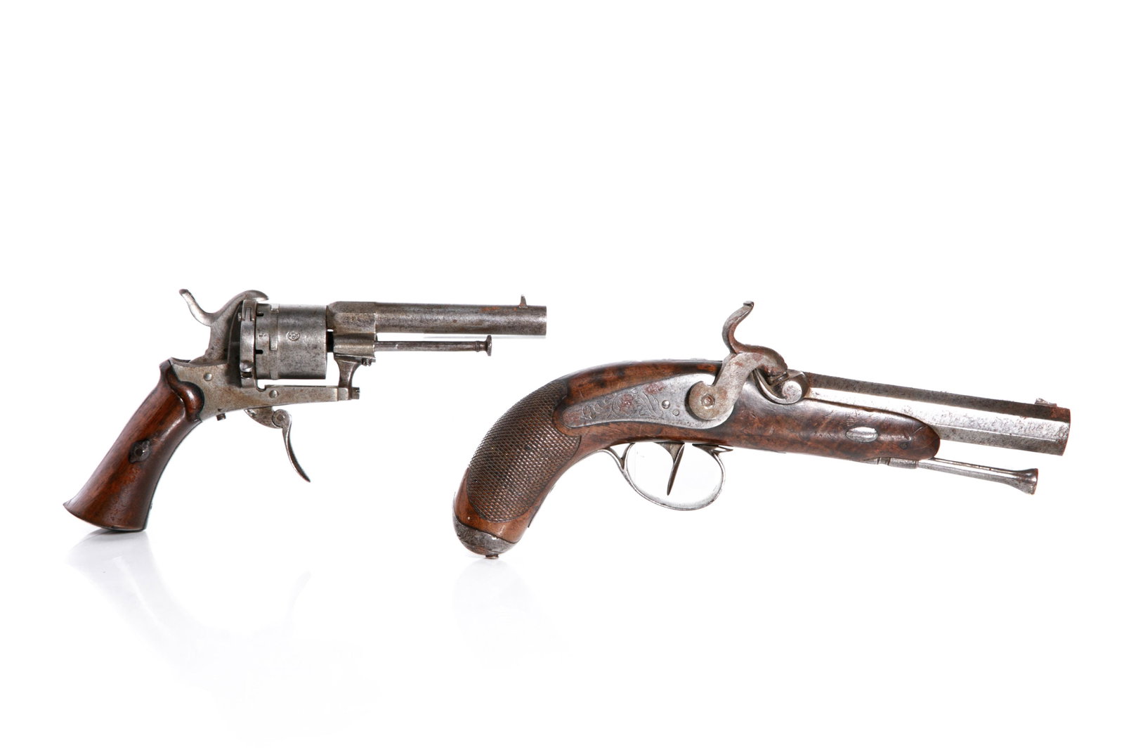 TWO 19th C BELGIAN PISTOLS: A single barrel percussion pistol with a back action lock. The barrel marked with a Liege proof mark. Together with a late 19th century Belgian pin fire pistol also marked with a Liege proof mark. L. 
