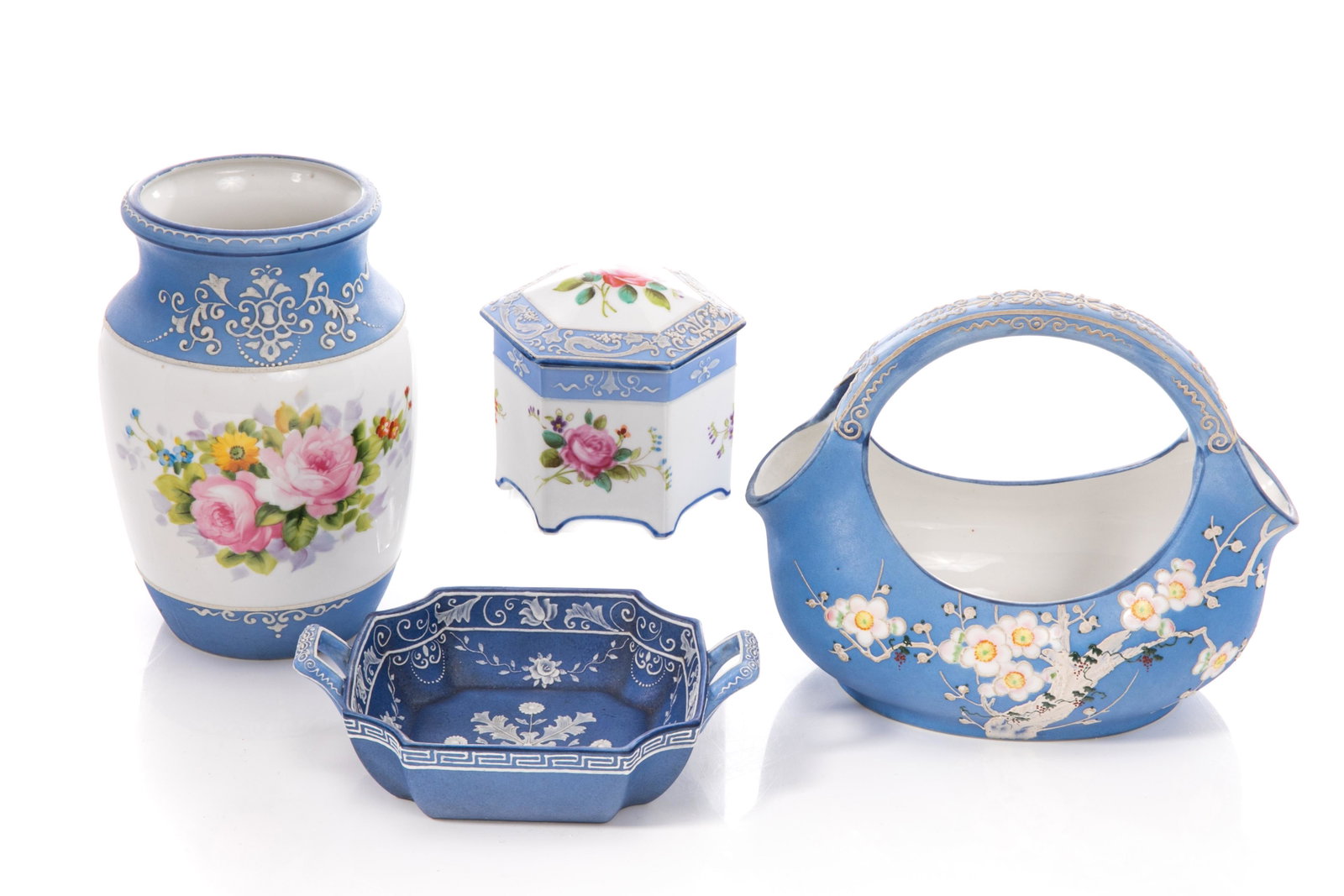 FOUR PIECES OF NIPPON JASPERWARE STYLE PORCELAIN: Includes four pieces of hand-painted Nippon porcelain in the manner of Wedgewood, featuring moriage decoration. Including one vase with painted flowers; one twin handled dish; one basket bowl; and one
