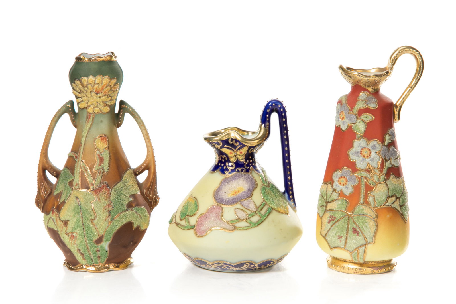 THREE MINIATURE NIPPON CORALENE PORCELAIN VASES: Includes a small two handled vase together with one small and one larger ewer, flowers in Coralene, gilding on rims, matte glazed. Japanese, Royal Kinran U.S. Patent 1909 mark. H. of tallest: 14 cm (5